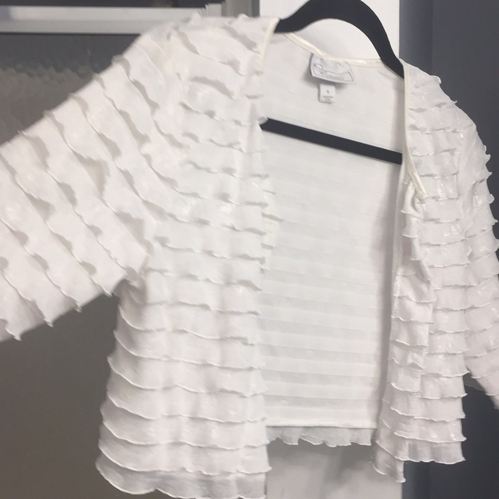 White ruffled jacket
